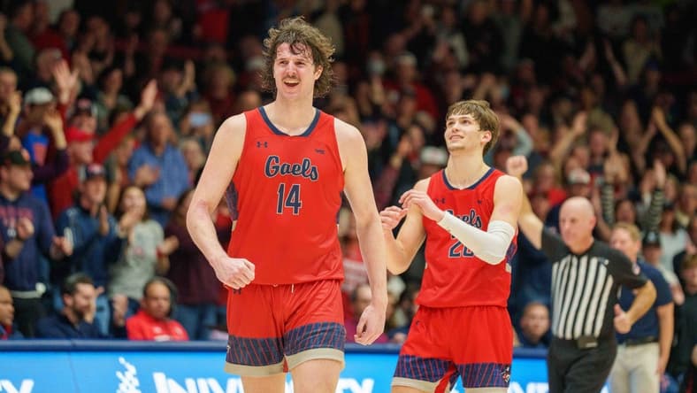 Feb 4, 2023; Moraga, California, USA; St. Mary's Gaels forward Kyle Bowen (14) and St. Mary's Gaels guard Aidan Mahaney (20) celebrate after the game against the Gonzaga Bulldogs at University Credit Union Pavilion. Mandatory Credit: Neville E. Guard-USA TODAY Sports