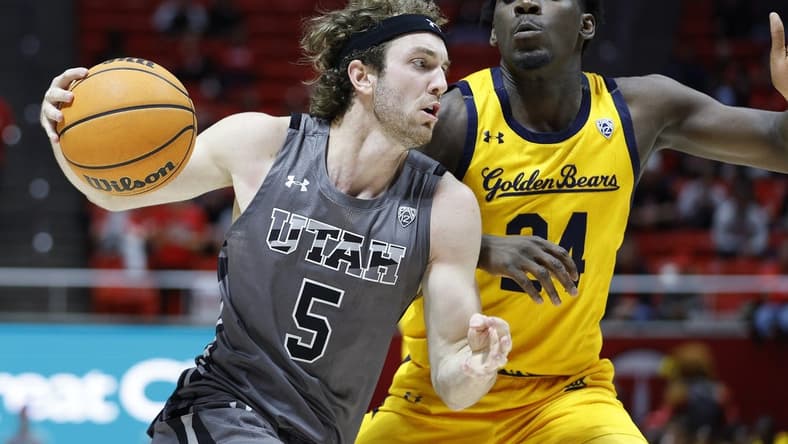 Feb 5, 2023; Salt Lake City, Utah, USA; Utah Utes guard Jaxon Brenchley (5) drives against California Golden Bears forward Sam Alajiki (24) in the second half at Jon M. Huntsman Center. Mandatory Credit: Jeffrey Swinger-USA TODAY Sports