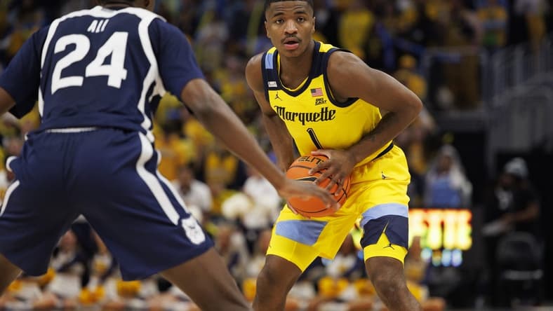 Feb 4, 2023; Milwaukee, Wisconsin, USA; Marquette Golden Eagles guard Kam Jones (1) during the game against the Butler Bulldogs at Fiserv Forum. Mandatory Credit: Jeff Hanisch-USA TODAY Sports