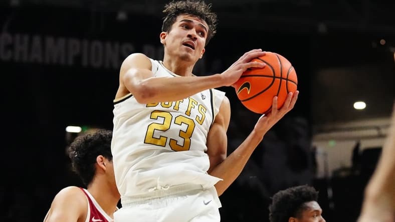 Feb 5, 2023; Boulder, Colorado, USA; Colorado Buffaloes forward Tristan da Silva (23) brings in a rebound in the second half against the Stanford Cardinal at the CU Events Center. Mandatory Credit: Ron Chenoy-USA TODAY Sports