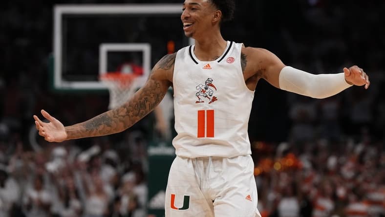 Feb 6, 2023; Coral Gables, Florida, USA; Miami Hurricanes guard Jordan Miller (11) reacts to the crowd during the first half against the Duke Blue Devils at Watsco Center. Mandatory Credit: Jasen Vinlove-USA TODAY Sports
