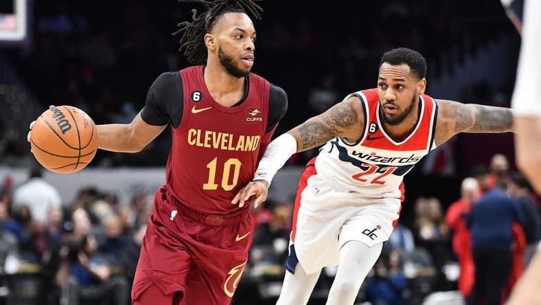 Feb 6, 2023; Washington, District of Columbia, USA; Cleveland Cavaliers guard Darius Garland (10) dribbles as Washington Wizards guard Monte Morris (22) defends during the first half at Capital One Arena. Mandatory Credit: Brad Mills-USA TODAY Sports