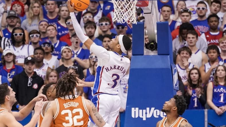 Feb 6, 2023; Lawrence, Kansas, USA; Kansas Jayhawks guard Dajuan Harris Jr. (3) shoots a layup against the Texas Longhorns during the first half at Allen Fieldhouse. Mandatory Credit: Denny Medley-USA TODAY Sports