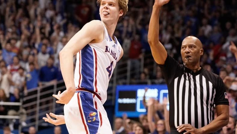 Kansas freshman guard Gradey Dick (4) reacts to a three-pointer made agains Texas in the first half of Monday's game against Texas inside Allen Fieldhouse.