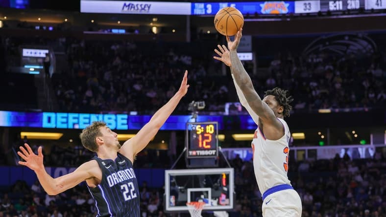 Feb 7, 2023; Orlando, Florida, USA; New York Knicks forward Julius Randle (30) shoots the ball over Orlando Magic forward Franz Wagner (22) during the second quarter at Amway Center. Mandatory Credit: Mike Watters-USA TODAY Sports