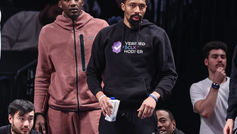 Feb 7, 2023; Brooklyn, New York, USA; Brooklyn Nets guard Spencer Dinwiddie (right) and forward Dorian Finney-Smith (left) looks on during the first half against the Phoenix Suns at Barclays Center. Mandatory Credit: Vincent Carchietta-USA TODAY Sports
