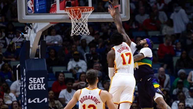 Feb 7, 2023; New Orleans, Louisiana, USA; New Orleans Pelicans forward Brandon Ingram (14) drives to the basket against Atlanta Hawks forward Onyeka Okongwu (17) during the first half at Smoothie King Center. Mandatory Credit: Stephen Lew-USA TODAY Sports