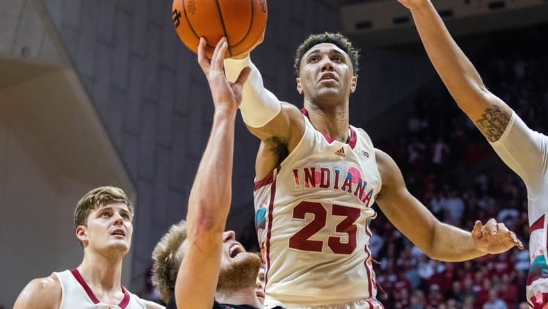 Feb 7, 2023; Bloomington, Indiana, USA; Indiana Hoosiers forward Trayce Jackson-Davis (23) blocks the shot of Rutgers Scarlet Knights guard Cam Spencer (10) in the second half at Simon Skjodt Assembly Hall. Mandatory Credit: Trevor Ruszkowski-USA TODAY Sports
