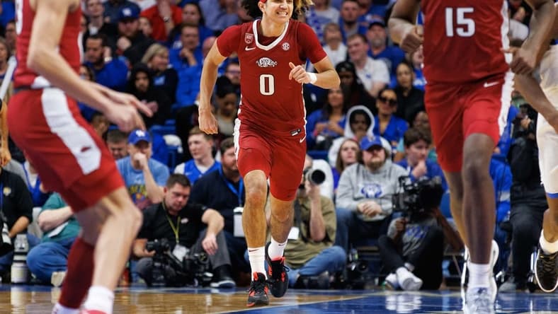 Feb 7, 2023; Lexington, Kentucky, USA; Arkansas Razorbacks guard Anthony Black (0) celebrates during the second half Kentucky Wildcats at Rupp Arena at Central Bank Center. Mandatory Credit: Jordan Prather-USA TODAY Sports