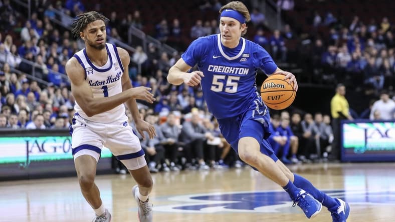 Feb 8, 2023; Newark, New Jersey, USA; Creighton Bluejays guard Baylor Scheierman (55) looks to drive past Seton Hall Pirates forward Tray Jackson (1) in the first half at Prudential Center. Mandatory Credit: Wendell Cruz-USA TODAY Sports