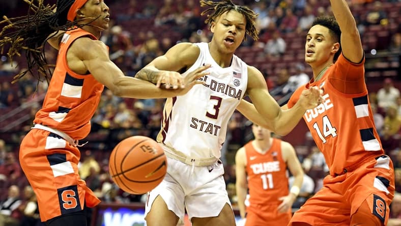 Feb 8, 2023; Tallahassee, Florida, USA; Syracuse Orange center Jesse Edwards (14) and forward Maliq Brown (1) pressure Florida State Seminoles guard Cameron Corhen (3) during the first half at Donald L. Tucker Center. Mandatory Credit: Melina Myers-USA TODAY Sports