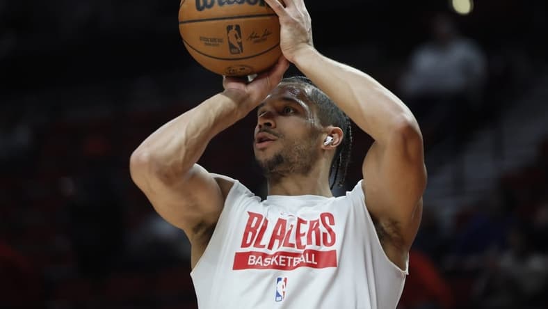 Feb 8, 2023; Portland, Oregon, USA; Portland Trail Blazers shooting guard Josh Hart (11) warms up prior to a game against the Golden State Warriors at Moda Center. Mandatory Credit: Soobum Im-USA TODAY Sports