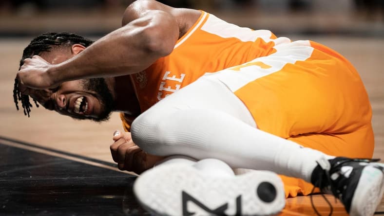 Tennessee guard Josiah-Jordan James (30) cries out after injuring his ankle during the second half of the game against Vanderbilt at Memorial Gymnasium Wednesday, Feb. 8, 2023, in Nashville, Tenn. Vanderbilt defeated Tennessee 66 to 65.

Ncaa Basketball Tennessee At Vanderbilt