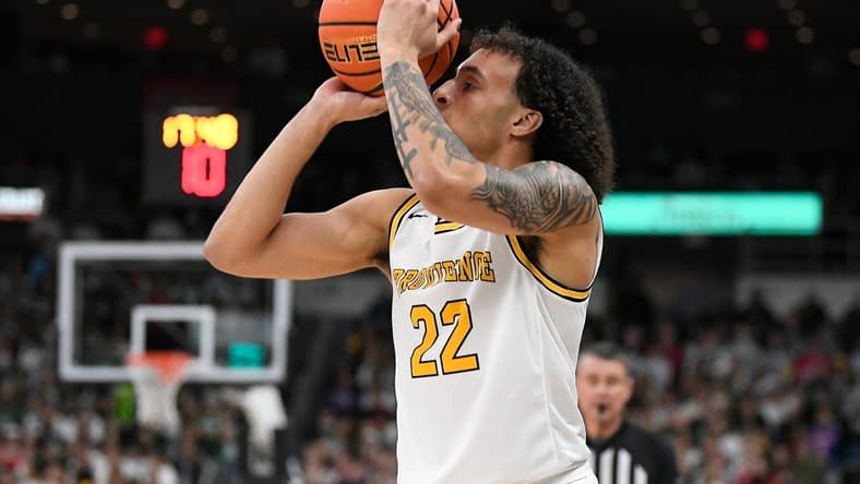 Feb 8, 2023; Providence, Rhode Island, USA; Providence Friars guard Devin Carter (22) shoots during the first half against the Georgetown Hoyas at Amica Mutual Pavilion. Mandatory Credit: Eric Canha-USA TODAY Sports