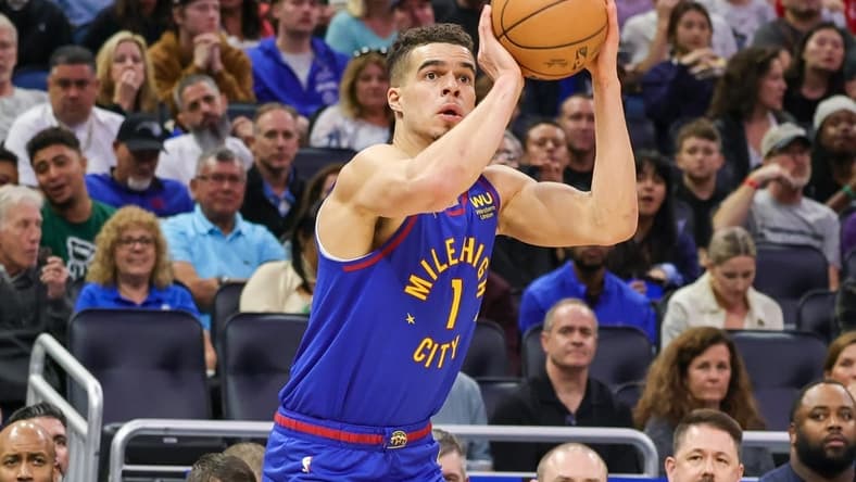 Feb 9, 2023; Orlando, Florida, USA; Denver Nuggets forward Michael Porter Jr. (1) shoots a three point basket against the Orlando Magic during the first quarter at Amway Center. Mandatory Credit: Mike Watters-USA TODAY Sports