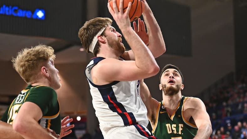 Feb 9, 2023; Spokane, Washington, USA; Gonzaga Bulldogs forward Drew Timme (2) is fouled on the shot by ]s5 in the first half at McCarthey Athletic Center. Mandatory Credit: James Snook-USA TODAY Sports