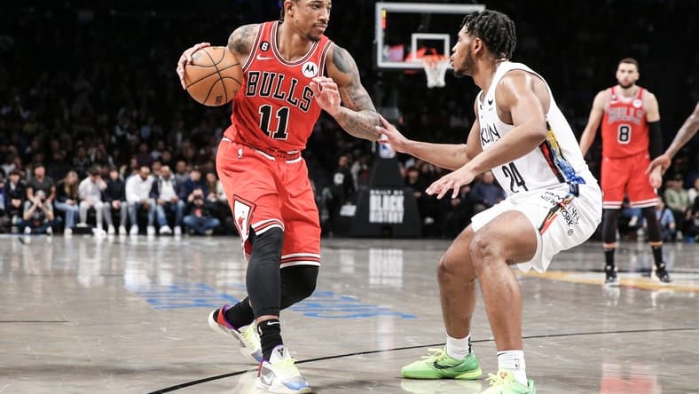 Feb 9, 2023; Brooklyn, New York, USA;  Chicago Bulls forward DeMar DeRozan (11) looks to drive past Brooklyn Nets guard Cam Thomas (24) in the fourth quarter at Barclays Center. Mandatory Credit: Wendell Cruz-USA TODAY Sports