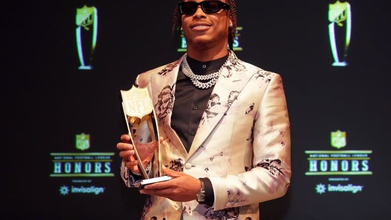 Feb 9, 2023; Phoenix, Arizona, US; Minnesota Vikings wide receiver Justin Jefferson poses for a photo after receiving the award for AP Offensive Player during the NFL Honors award show at Symphony Hall. Mandatory Credit: Kirby Lee-USA TODAY Sports