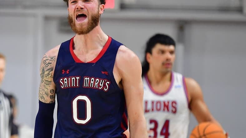 Feb 9, 2023; Los Angeles, California, USA; St. Mary's Gaels guard Logan Johnson (0) reacts against the Loyola Marymount Lions during the second half at Gersten Pavilion. Mandatory Credit: Gary A. Vasquez-USA TODAY Sports