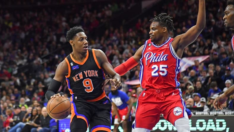 Feb 10, 2023; Philadelphia, Pennsylvania, USA; New York Knicks guard RJ Barrett (9) is defended by Philadelphia 76ers forward Danuel House Jr. (25) during the second quarter at Wells Fargo Center. Mandatory Credit: Eric Hartline-USA TODAY Sports