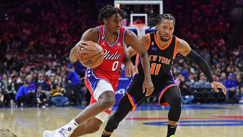 Feb 10, 2023; Philadelphia, Pennsylvania, USA; Philadelphia 76ers guard Tyrese Maxey (0) drives to the basket against New York Knicks guard Jalen Brunson (11) during the third quarter at Wells Fargo Center. Mandatory Credit: Eric Hartline-USA TODAY Sports