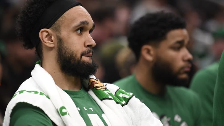 Feb 10, 2023; Boston, Massachusetts, USA; Boston Celtics guard Derrick White (9) sits on the bench during the second half against the Charlotte Hornets at TD Garden. Mandatory Credit: Bob DeChiara-USA TODAY Sports
