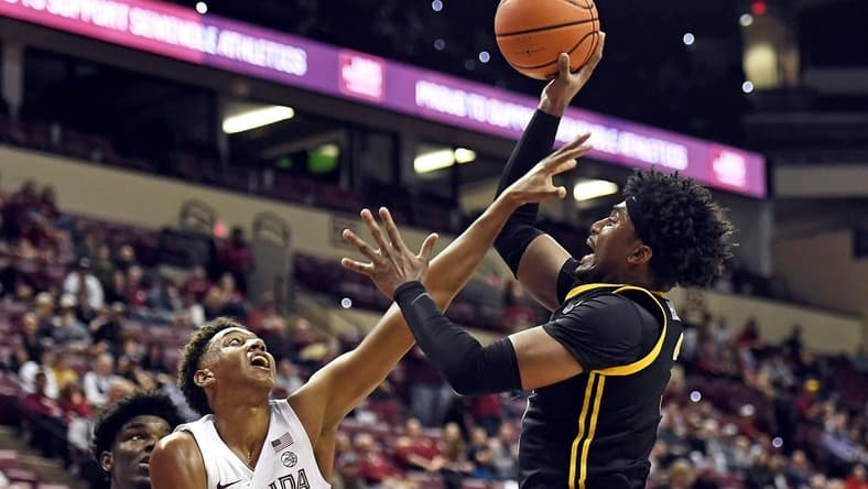 Feb 11, 2023; Tallahassee, Florida, USA; Pittsburgh Panthers forward Blake Hinson (2) shoots the ball over Florida State Seminoles forward Baba Miller (11) during the first half at Donald L. Tucker Center. Mandatory Credit: Melina Myers-USA TODAY Sports