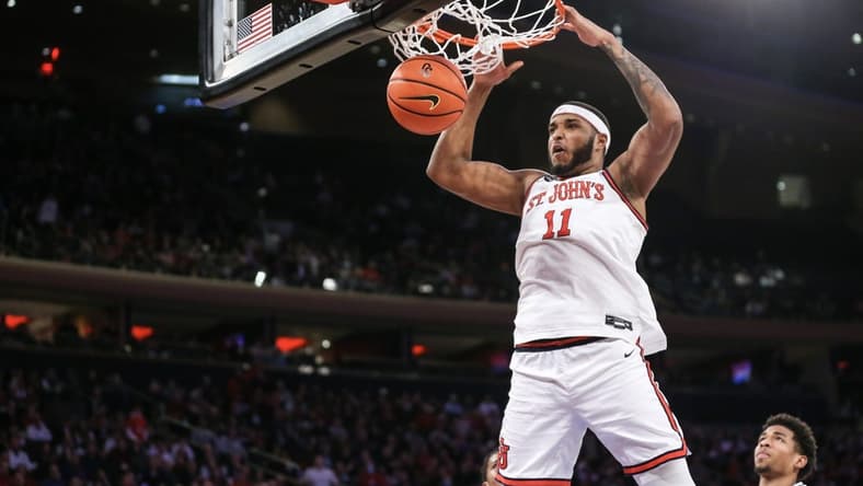Feb 11, 2023; New York, New York, USA; St. John's Red Storm center Joel Soriano (11) dunks in the second half against the Providence Friars at Madison Square Garden. Mandatory Credit: Wendell Cruz-USA TODAY Sports