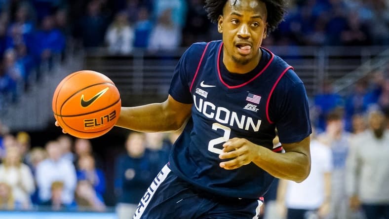 Feb 11, 2023; Omaha, Nebraska, USA; Connecticut Huskies guard Tristen Newton (2) drives to the hoop during the second half against the Creighton Bluejays at CHI Health Center Omaha. Mandatory Credit: Dylan Widger-USA TODAY Sports
