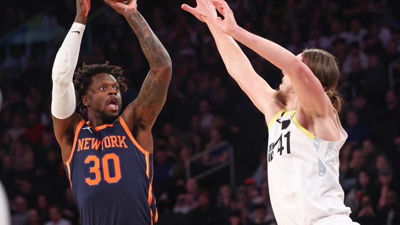 Feb 11, 2023; New York, New York, USA; New York Knicks forward Julius Randle (30) shoots the ball against Utah Jazz forward Kelly Olynyk (41) during the first half at Madison Square Garden. Mandatory Credit: Vincent Carchietta-USA TODAY Sports