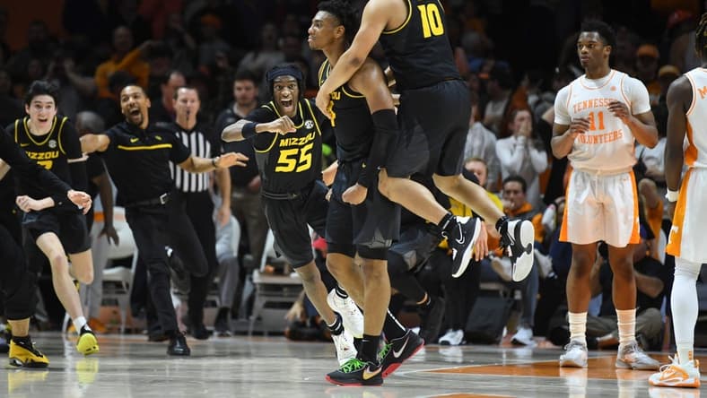 Missouri point guard Nick Honor (10) celebrates Missouri guard DeAndre Gholston (4) game winning buzzer beater during an NCAA college basketball game between the Missouri Tigers and the Tennessee Volunteers in Thompson-Boling Arena in Knoxville, Saturday Feb. 11, 2023. Missouri defeated Tennessee in the final second of the game, 86-85.
Tennesseemissouri0211 1741