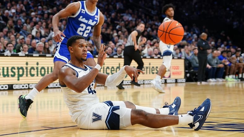 Feb 11, 2023; Philadelphia, Pennsylvania, USA; Villanova Wildcats forward Eric Dixon (43) passes the ball against the Seton Hall Pirates during the first half at Wells Fargo Center. Mandatory Credit: Gregory Fisher-USA TODAY Sports