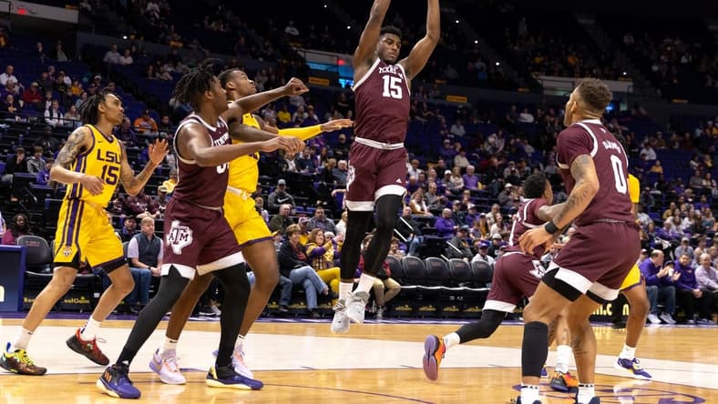 Feb 11, 2023; Baton Rouge, Louisiana, USA; Texas A&M Aggies forward Henry Coleman III (15) grabs a rebound against the LSU Tigers during the first half at Pete Maravich Assembly Center. Mandatory Credit: Stephen Lew-USA TODAY Sports