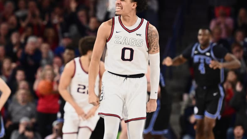 Feb 11, 2023; Spokane, Washington, USA; Gonzaga Bulldogs guard Julian Strawther (0) reacts after a play against the Brigham Young Cougars in the second half at McCarthey Athletic Center. Gonzaga won 88-81. Mandatory Credit: James Snook-USA TODAY Sports