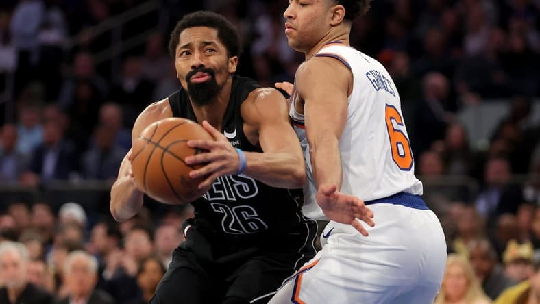 Feb 13, 2023; New York, New York, USA; Brooklyn Nets guard Spencer Dinwiddie (26) is fouled as he shoots by New York Knicks guard Quentin Grimes (6) during the second quarter at Madison Square Garden. Mandatory Credit: Brad Penner-USA TODAY Sports