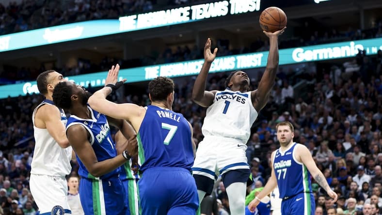 Feb 13, 2023; Dallas, Texas, USA; Minnesota Timberwolves guard Anthony Edwards (1) shoots during the second quarter against the Dallas Mavericks at American Airlines Center. Mandatory Credit: Kevin Jairaj-USA TODAY Sports