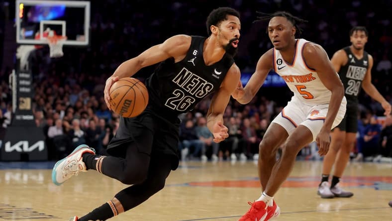 Feb 13, 2023; New York, New York, USA; Brooklyn Nets guard Spencer Dinwiddie (26) drives to the basket against New York Knicks guard Immanuel Quickley (5) during the second quarter at Madison Square Garden. Mandatory Credit: Brad Penner-USA TODAY Sports