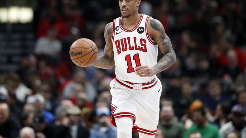 Feb 13, 2023; Chicago, Illinois, USA; Chicago Bulls forward DeMar DeRozan (11) brings the ball up court against the Orlando Magic during the first half at United Center. Mandatory Credit: Kamil Krzaczynski-USA TODAY Sports