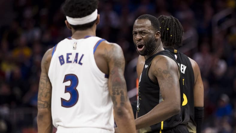 Feb 13, 2023; San Francisco, California, USA; Golden State Warriors forward Draymond Green (23) yells at Washington Wizards guard Bradley Beal (3) during the second half at Chase Center. Mandatory Credit: John Hefti-USA TODAY Sports