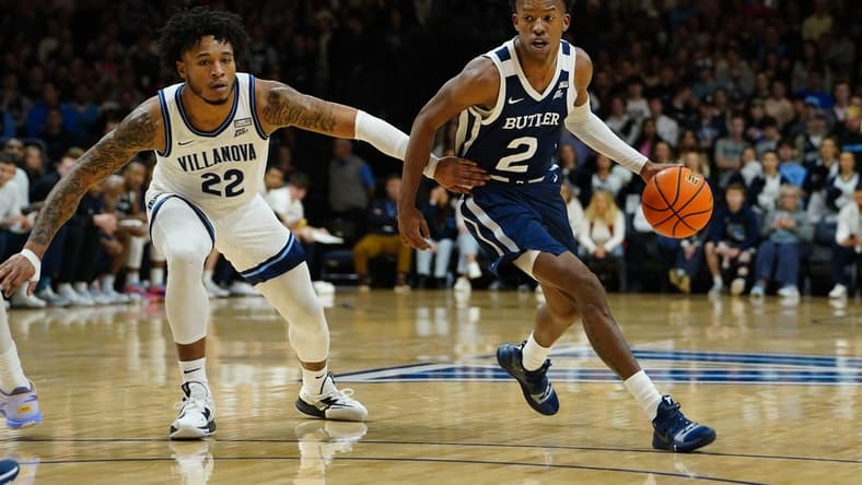 Feb 14, 2023; Villanova, Pennsylvania, USA; Butler Bulldogs guard Eric Hunter Jr. (2) dribbles the ball against Villanova Wildcats forward Cam Whitmore (22) during the first half  at William B. Finneran Pavilion. Mandatory Credit: Gregory Fisher-USA TODAY Sports