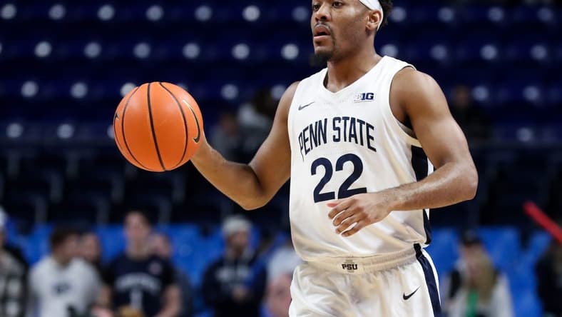 Feb 14, 2023; University Park, Pennsylvania, USA; Penn State Nittany Lions guard Jalen Pickett (22) dribbles the ball during the first half against the Illinois Fighting Illini at Bryce Jordan Center. Penn State defeated Illinois 93-81. Mandatory Credit: Matthew OHaren-USA TODAY Sports