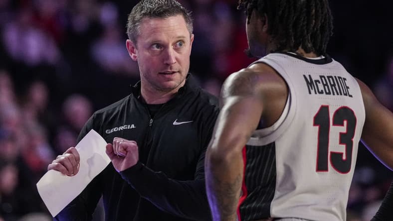 Feb 14, 2023; Athens, Georgia, USA; Georgia Bulldogs head coach Mike White talks to guard Mardrez McBride (13) during the game against the LSU Tigers during the second half at Stegeman Coliseum. Mandatory Credit: Dale Zanine-USA TODAY Sports