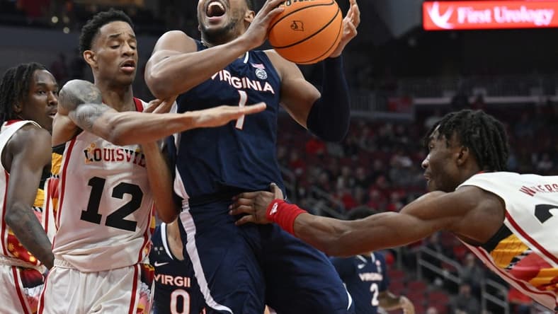 Feb 15, 2023; Louisville, Kentucky, USA; Virginia Cavaliers forward Jayden Gardner (1) drives to the basket against Louisville Cardinals forward JJ Traynor (12) and Louisville Cardinals forward Jae'Lyn Withers (24) during the first half at KFC Yum! Center. Mandatory Credit: Jamie Rhodes-USA TODAY Sports