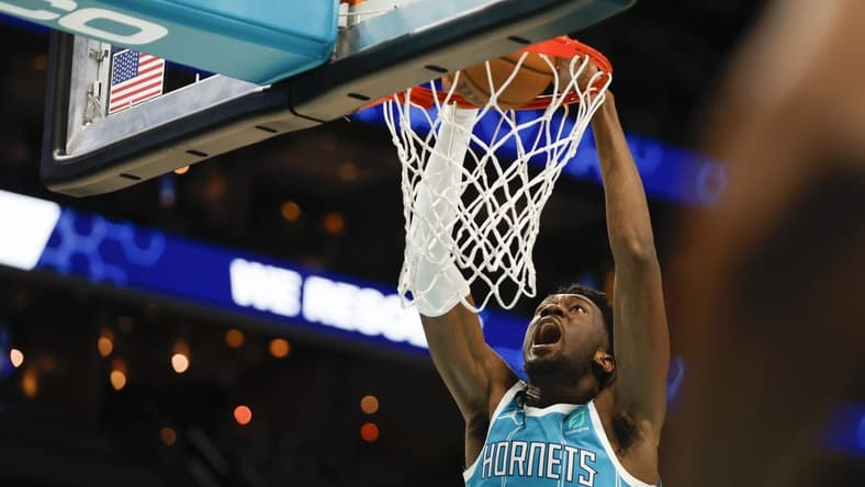 Feb 15, 2023; Charlotte, North Carolina, USA; Charlotte Hornets center Mark Williams (5) dunks against the San Antonio Spurs during the second half at Spectrum Center. The Charlotte Hornets won 120-110. Mandatory Credit: Nell Redmond-USA TODAY Sports