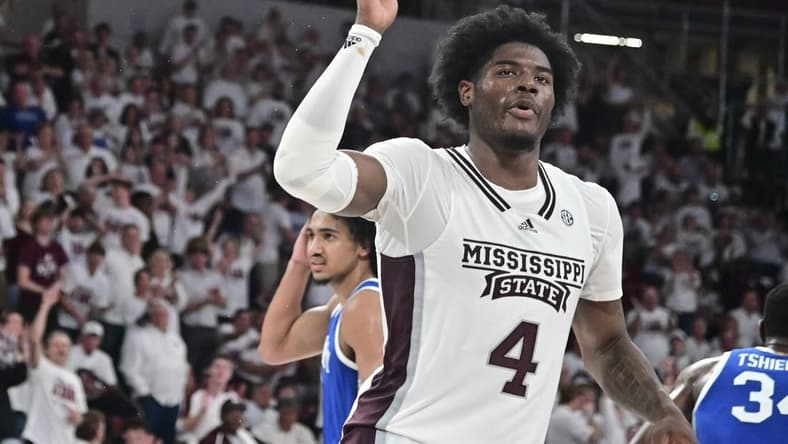 Feb 15, 2023; Starkville, Mississippi, USA; Mississippi State Bulldogs guard Cameron Matthews (4) reacts after dunking the ball against the Kentucky Wildcats during the second half at Humphrey Coliseum. Mandatory Credit: Matt Bush-USA TODAY Sports