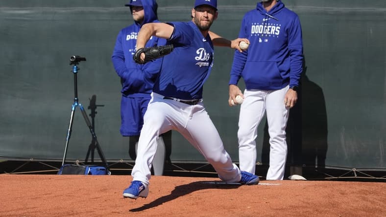 Feb 16, 2023; Glendale, AZ, USA; Los Angeles Dodgers starting pitcher Clayton Kershaw (22) throws in the bullpen during spring training camp. Mandatory Credit: Rick Scuteri-USA TODAY Sports