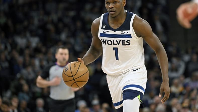 Feb 16, 2023; Minneapolis, Minnesota, USA;  Minnesota Timberwolves guard Anthony Edwards (1) brings the ball up-court against the Washington Wizards during the second quarter at Target Center. Mandatory Credit: Nick Wosika-USA TODAY Sports