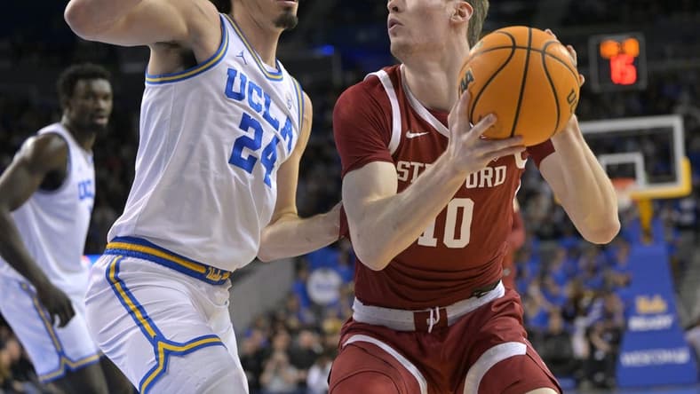 Feb 16, 2023; Los Angeles, California, USA; Stanford Cardinal forward Max Murrell (10) is defended by UCLA Bruins guard Jaime Jaquez Jr. (24) in the first half at Pauley Pavilion presented by Wescom. Mandatory Credit: Jayne Kamin-Oncea-USA TODAY Sports