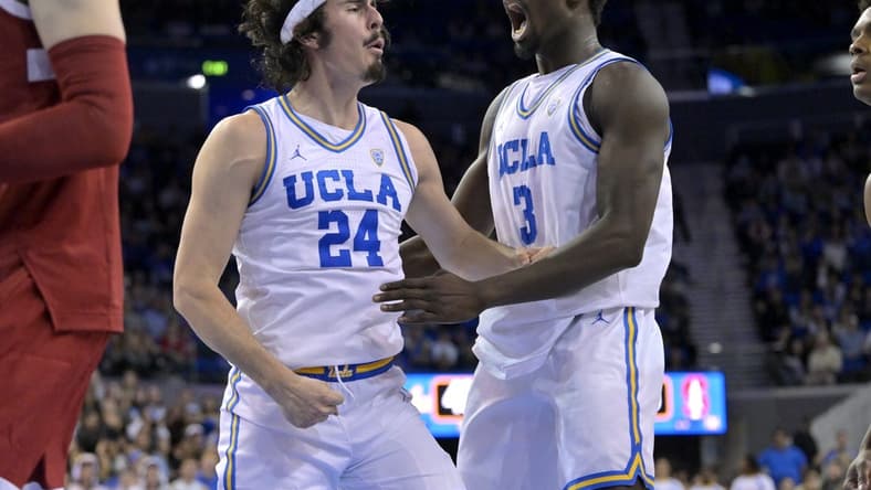 Feb 16, 2023; Los Angeles, California, USA; UCLA Bruins guard Jaime Jaquez Jr. (24) and forward Adem Bona (3) celebrate after a basket in the second half against the Stanford Cardinal at Pauley Pavilion presented by Wescom. Mandatory Credit: Jayne Kamin-Oncea-USA TODAY Sports