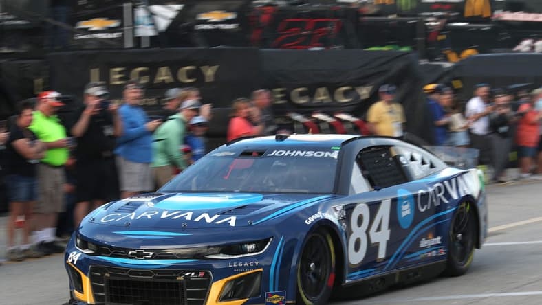 Jimmie Johnson rolls past the fans in the garage Friday February 17, 2023 for cup series practice.
Dtb Trtack Action 6
